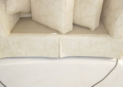 This is a picture of a white cotton sofa after cleaning