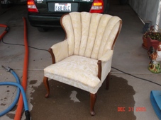 Picture shows antique arm chair after cleaning